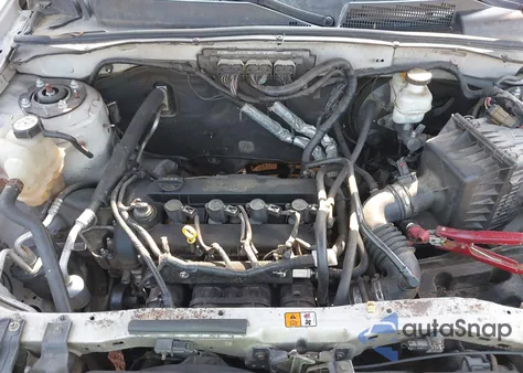 2009 Mercury Mariner I4 from USA, damaged, VIN 4M2CU91769KJ21418